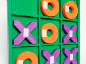 BRAILLE TIC TAC TOE SET WITH GREEN TRAY