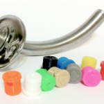 Jackson Tracheotomy Tube with Solid Colored Plugs